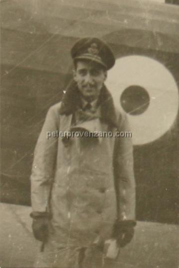 Peter Provenzano Photo Album Image_copy_035.jpg - Peter Provenzano standing on the side of an Avro Anson I.  RAF Station Tern Hill, fall of 1940.